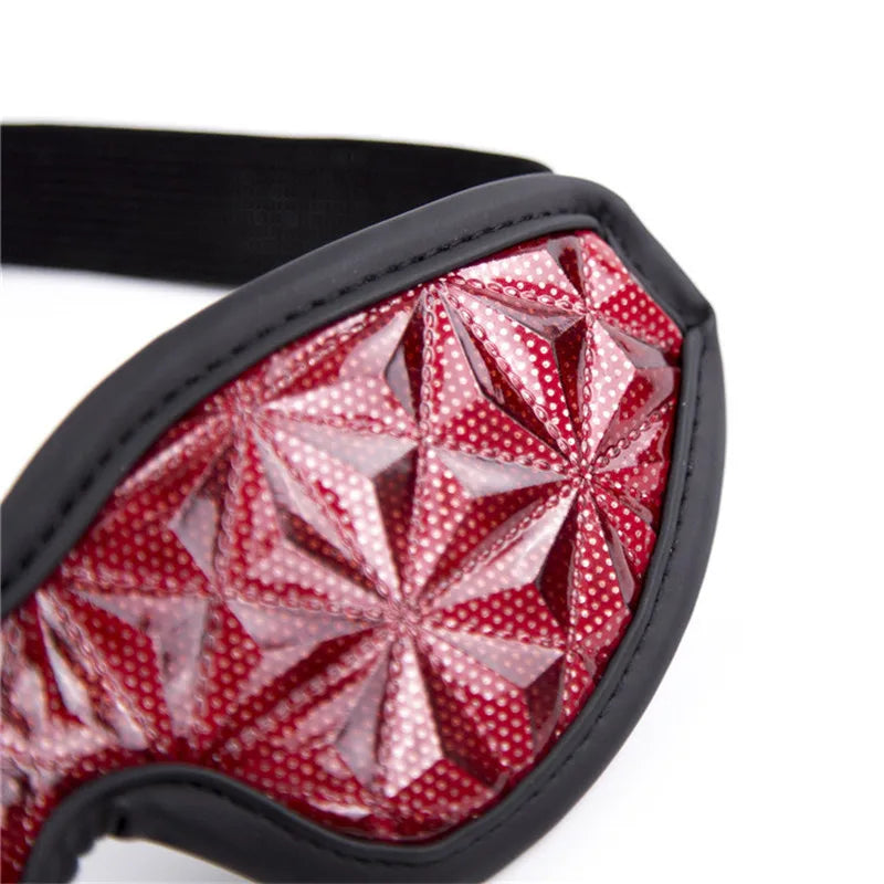 Close-up of the embossed red faux leather and black trim